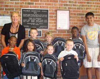 TANA Donates 150 Backpacks in Michigan